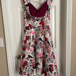 Pinup style Lindy Bop butterfly and flower dress. Silk material w/ accent bust.